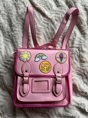 Sugar Thrillz Patched Backpack in pink vegan leather